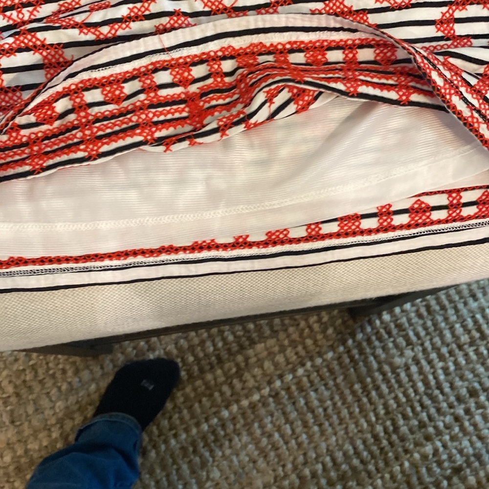 Really cute white with black stripes mini skirt with stitched red X’s - Picture 4 of 5